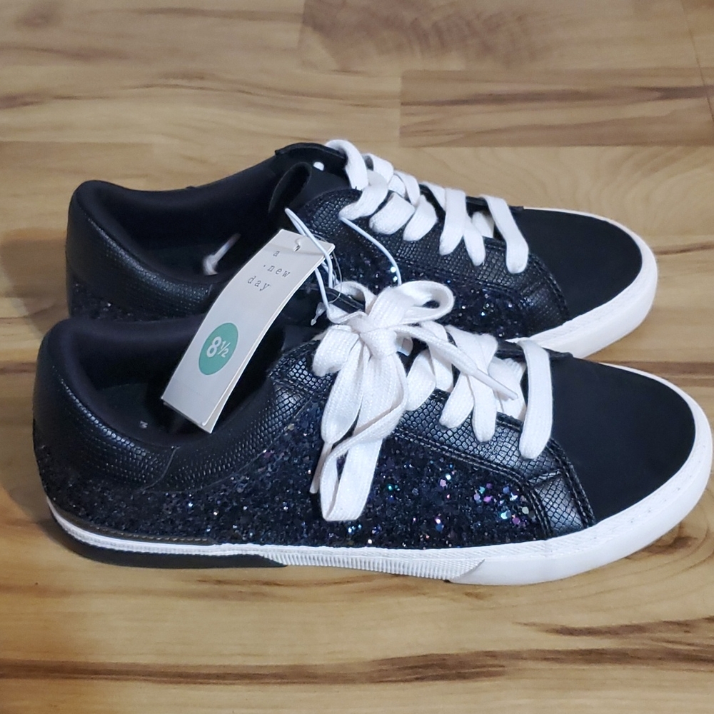 A new day, brand new women's glittered sneakers.  Size 8.5, black.